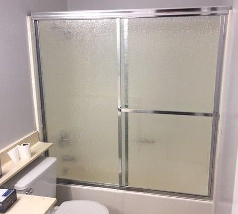 Guest bath with new shower door and hardware