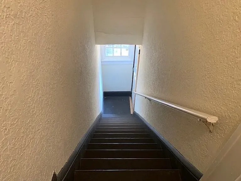 Private entrance/exit (two exist...one on St. John's, one to back property, close to parking)