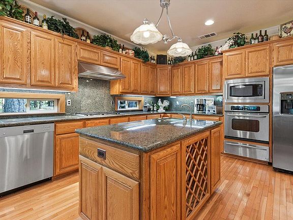 4th image of 32939 Piney Woods Ln