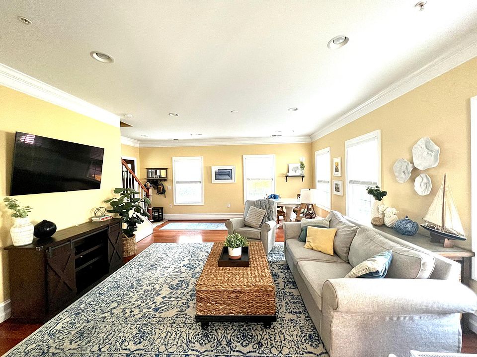 Open concept living area _ recessed lighting throughout