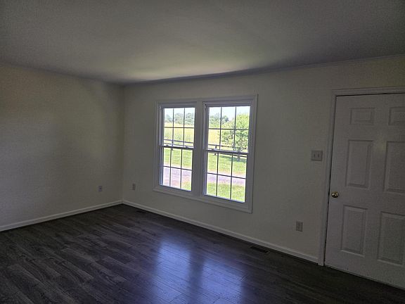 Family room/living room overlooking fields and pond.