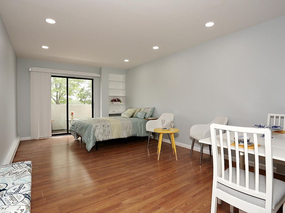 Living room, dining room, and bedroom combo open concept