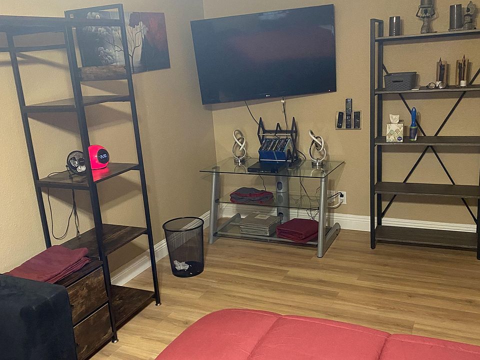Furnished bedroom media corner