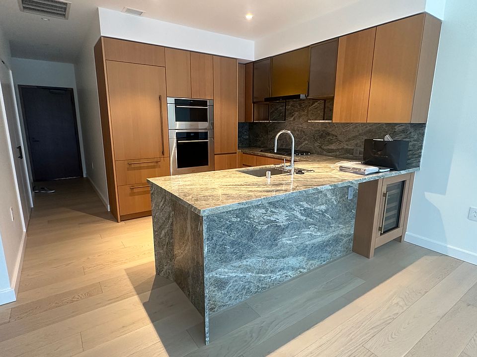 Sub Zero Appliances. Wine Fridge. Fridge has built in water dispenser.