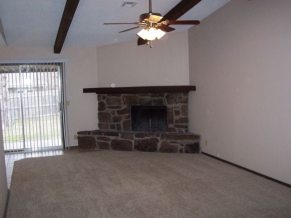 Living Room with wood burning Fireplace