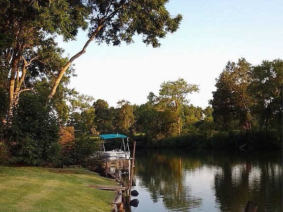 Boat docking area by garage.