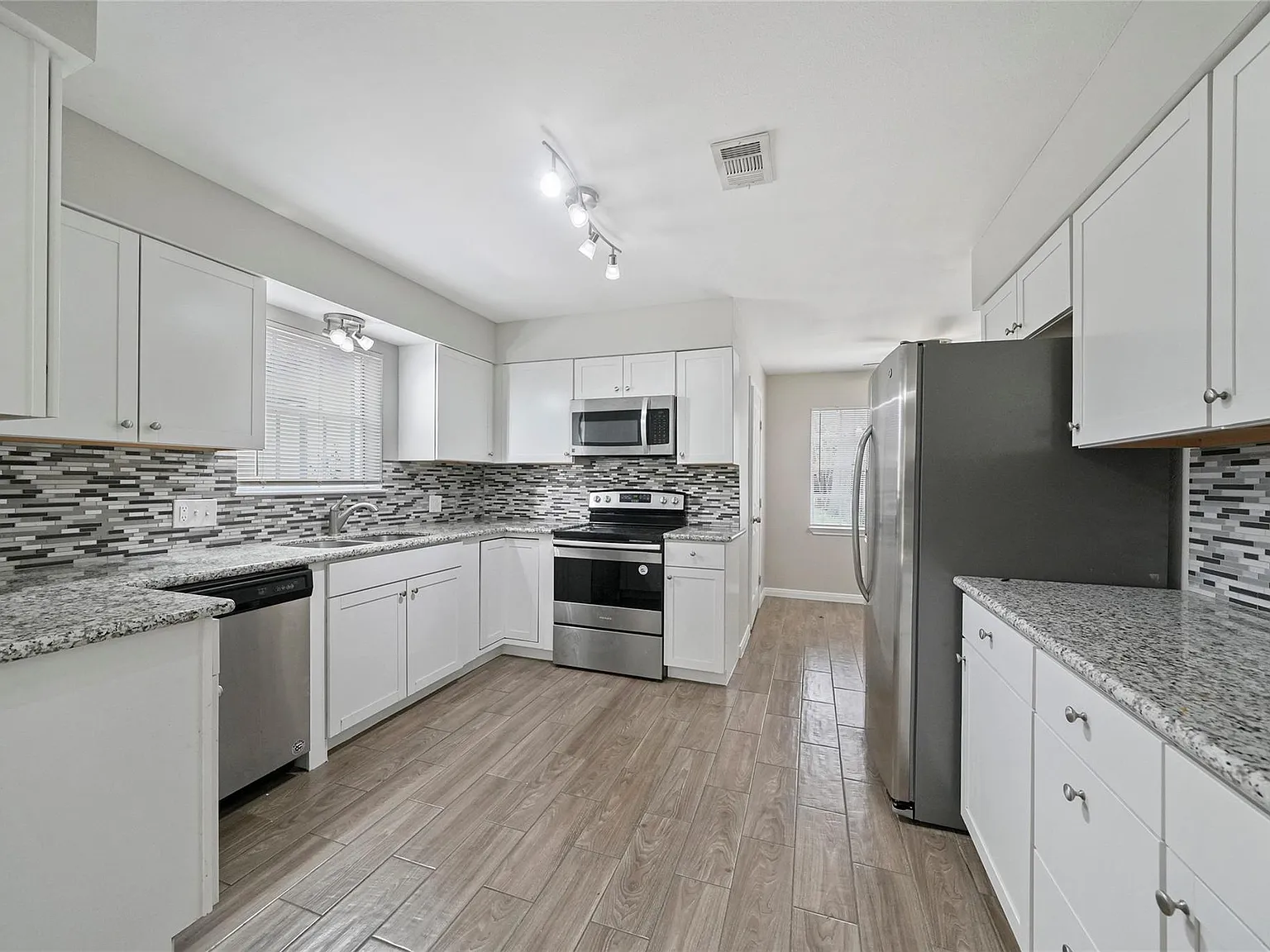 4 bed, 2.0 bath, 2460 sqft, $2,449 — Photo 1