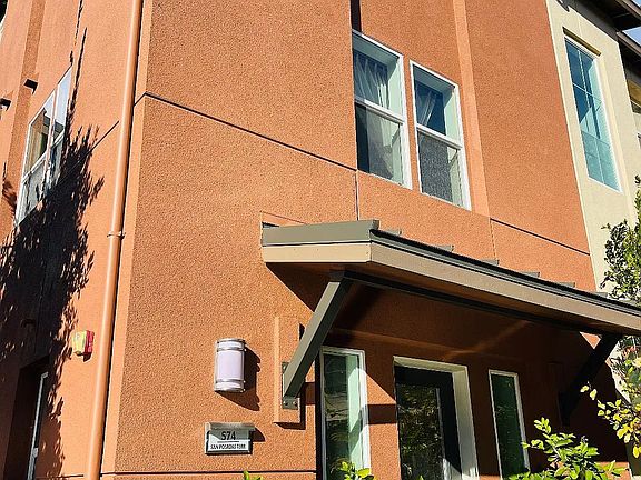 Full entrance and 3-floor view of the townhouse