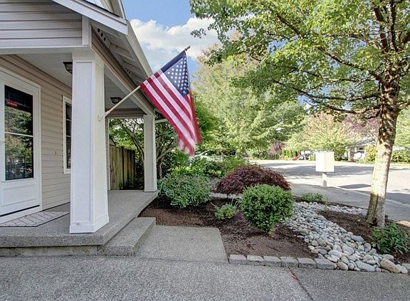 Beautiful trees in front yard, bring shade and seasonal color ch
