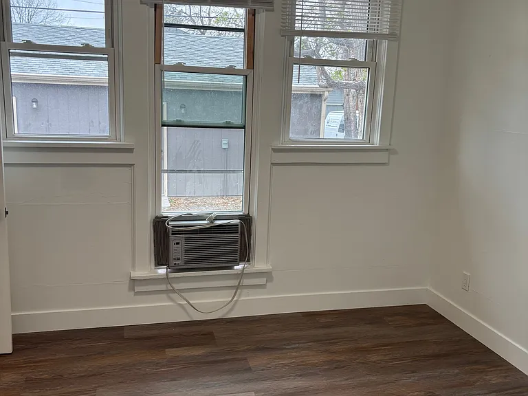New flooring in spacious bedroom