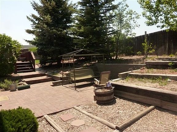 Hard To Tell, But There's A Swing Here For Adults To Relax & Watch The Kids!