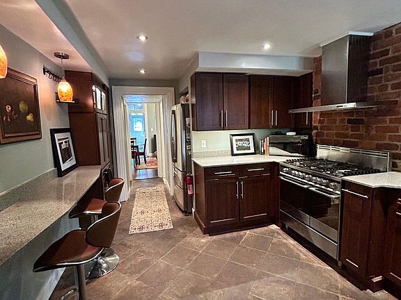 Kitchen with breakfast bar.