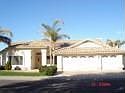 Beautifully Landscaped home with 3 car garge
