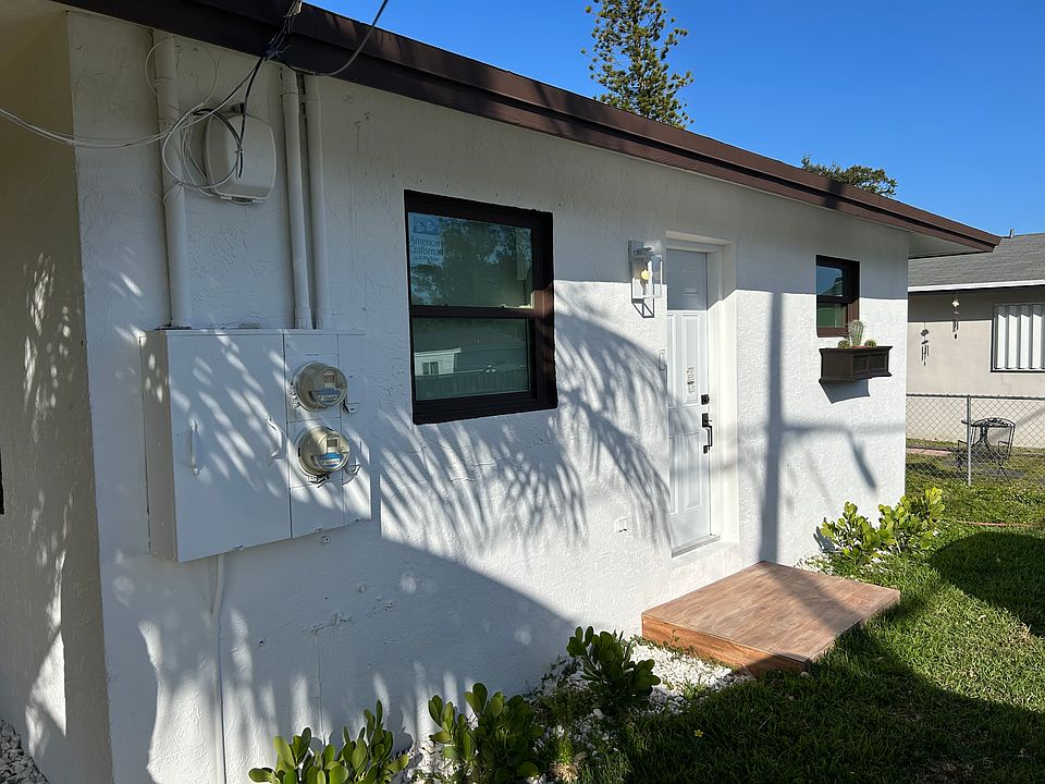 Side door that opens to the primary bedroom from the parking lot