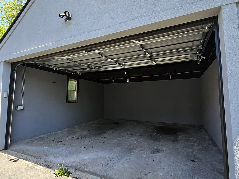 Detached garage with remote garage door opener