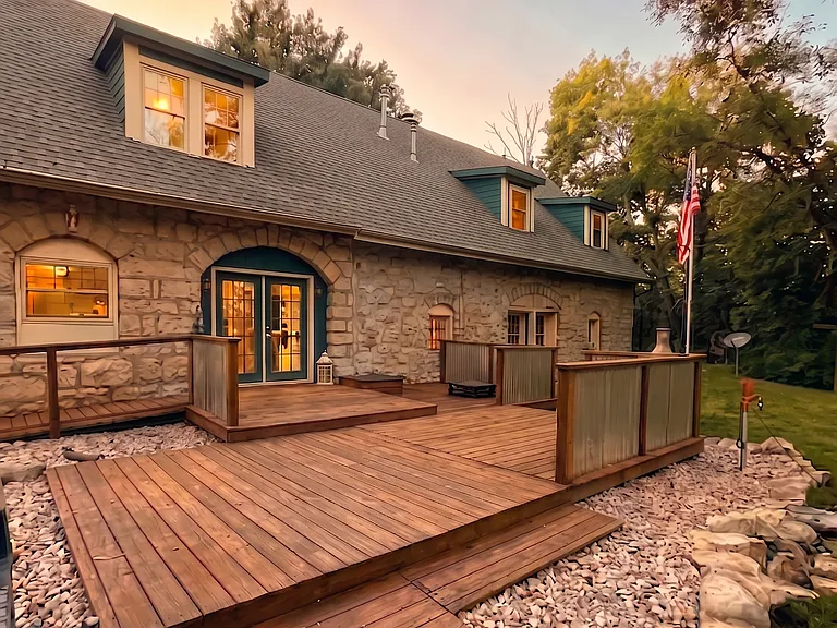 Expansive outdoor deck right off the kitchen, built to handle a large crowd.