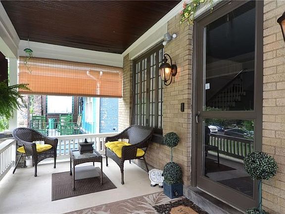 Welcome home!! The porch is so spacious, we couldn't get it all in one photo!!