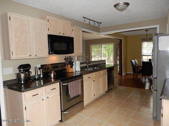 5th image of 12471 Windy Willows Dr N