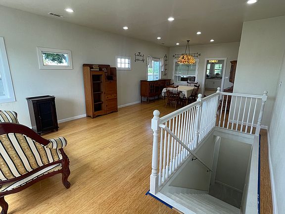 Entry way looking into front room and dinning room.