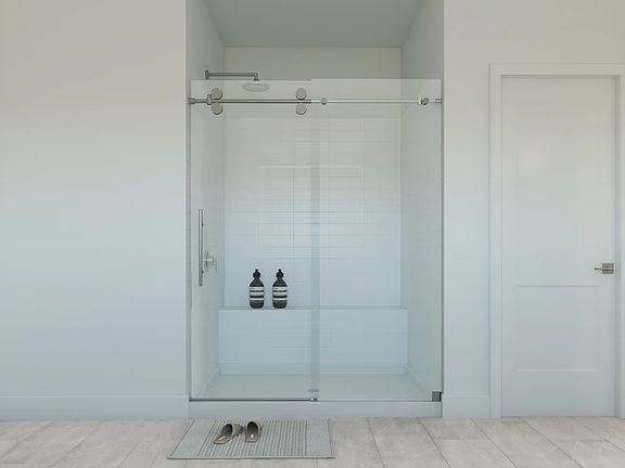 Primary bath with glass shower enclosure