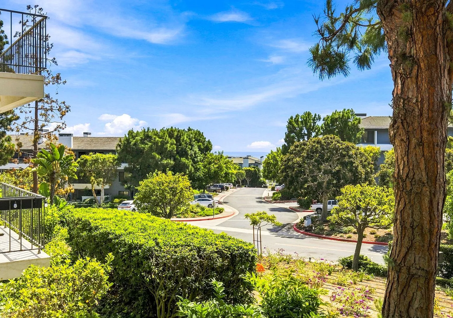 Coastal Condo in Gated Versailles Community — Photo 1