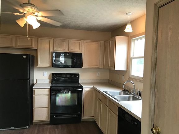 Kitchen with all appliances and over-the-range microwave