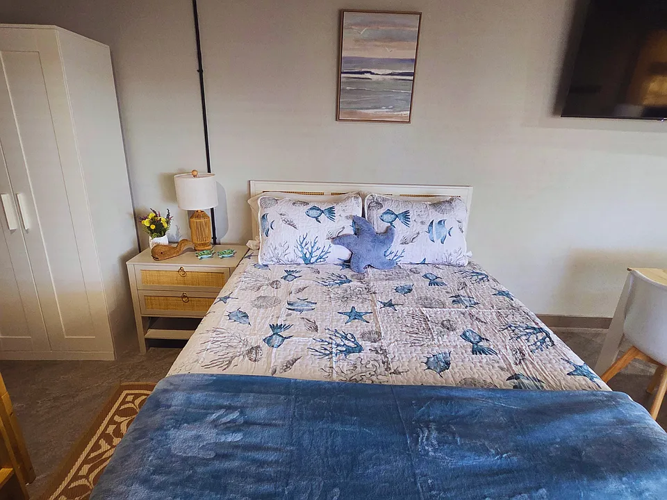 Rest easy with a queen bed, luxe linens, comfy pillows, and spacious closet.