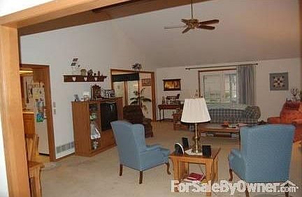 Great Room 18 X 27 : Open concept with doorways to dining area and to the kitchen.
