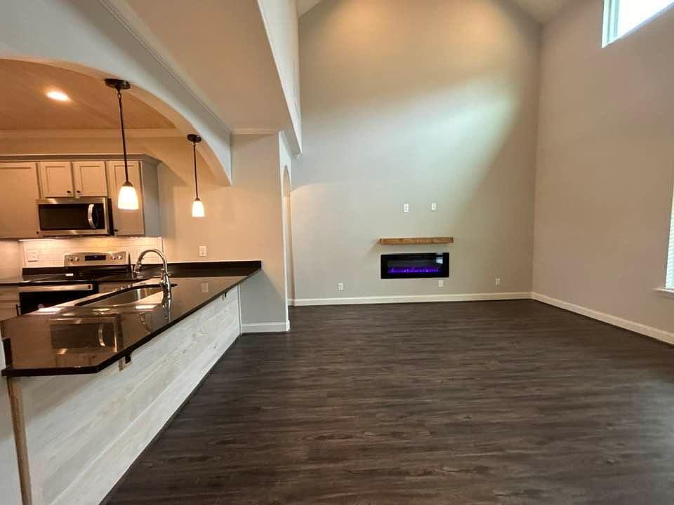 View of breakfast bar & 2-story den!