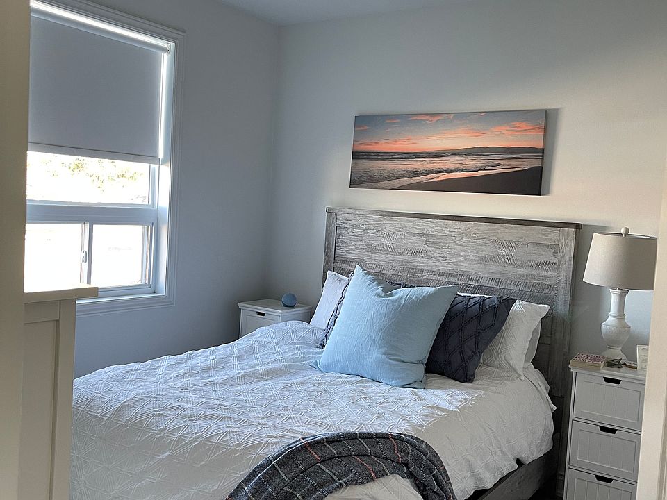 Master bedroom with walk in closet and ensuite bathroom