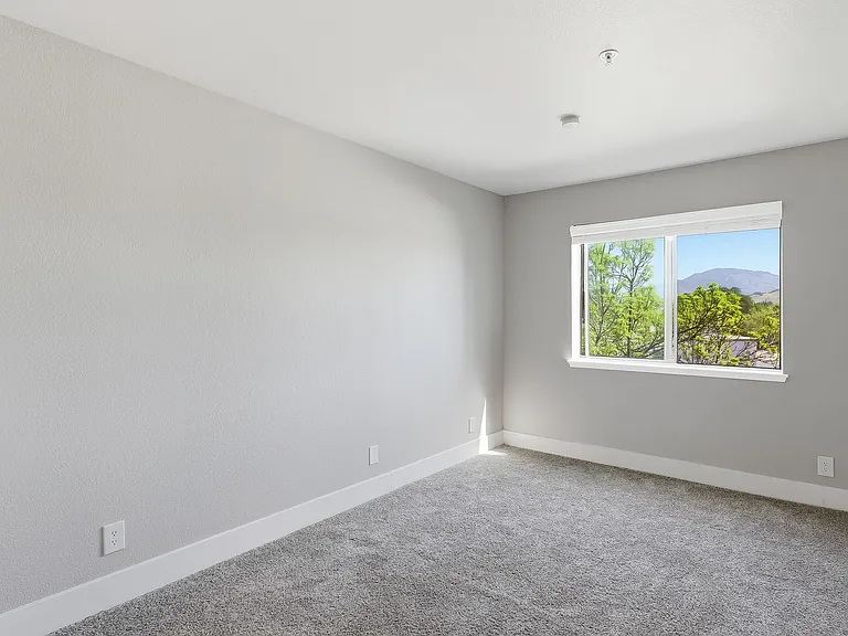 Retreat to a bedroom built for relaxation.