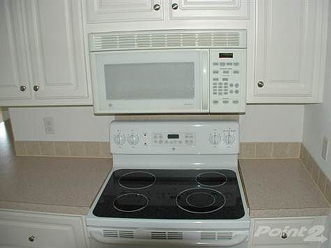 BUILT IN MICROWAVE & SMOOTH TOP RANGE