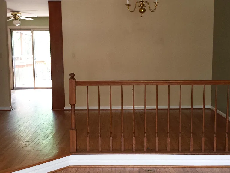 living room toward dining area and kitchen