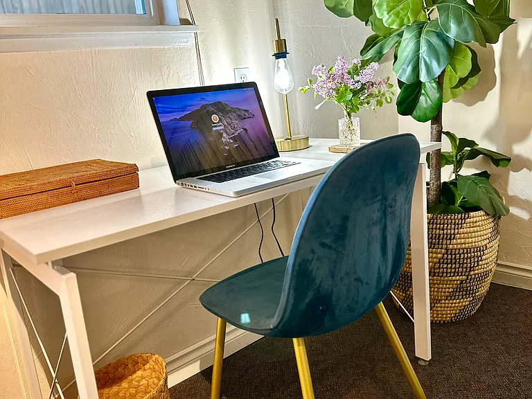 Another desk with a garden view in the front area.