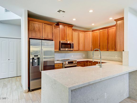 4th image of 10212 E WHITE FEATHER Lane