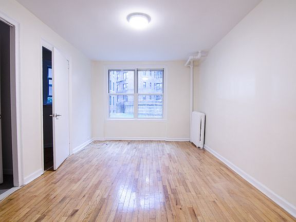 5th image of 34-47 90th St APT H12