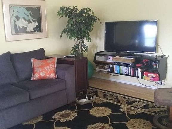 Wall-hung TV cabinet.