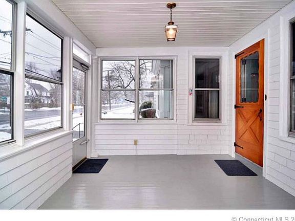 ENCLOSED FRONT PORCH