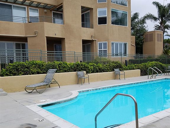 This unit is located on the 1st floor in front of the pool/spa/bbq area. The pool area is usually very quiet even in summer months. The large patio faces the pool and the smaller patio faces the lagoon on the other side of the large glass window.
