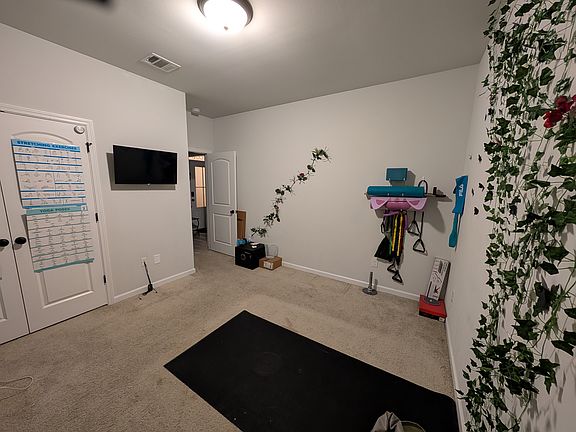 Guest bedroom with carpet