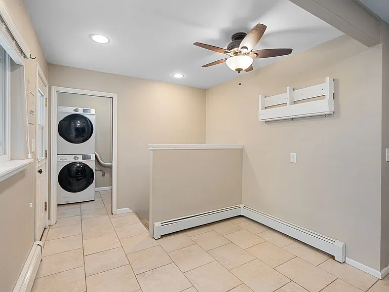 Eat-in Kitchen with Washer and Dryer tucked away in half bath.