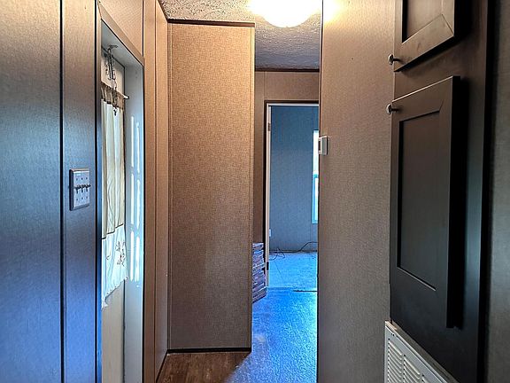 hall two laundry area guest bath and guest rooms