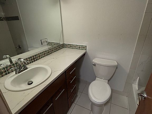 5th image of 1231 N Downing St APT 205