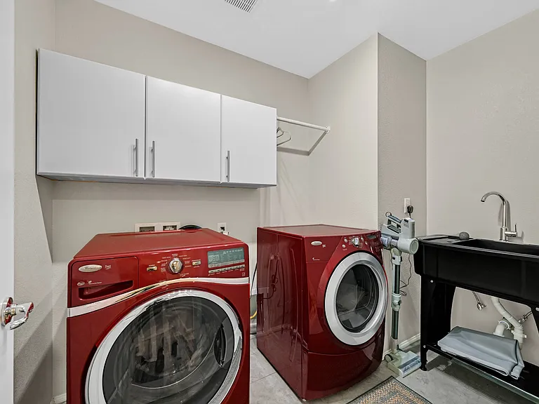 Large capacity washer and dryer combo with separate sink for pre-washing/soaking.