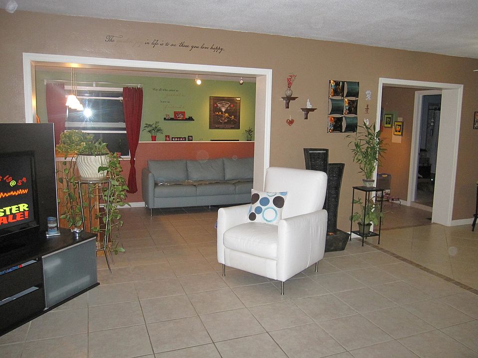 Living room looking into rec room