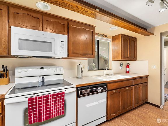 Kitchen overlooks private porch>