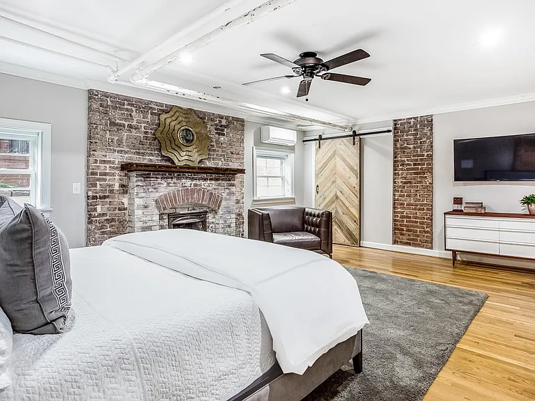 Large bedroom with seating area