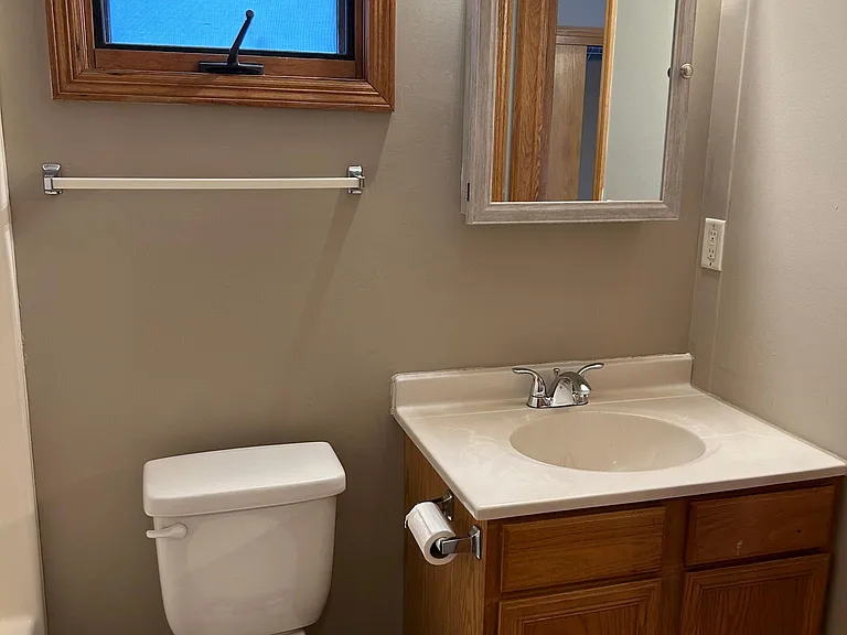 Main floor bathroom opens to Main Bedroom as well