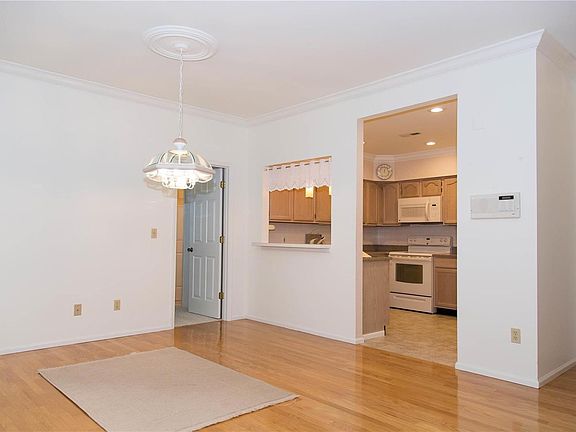 You have a breakfast bar at the opening into the kitchen.