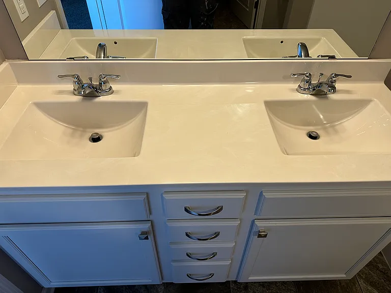 Dual vanity in primary bathroom.